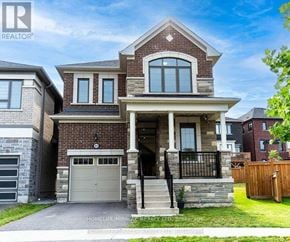 Pickering apartment for rent - A brick house with a garage is for sale.