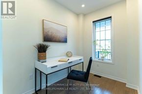 Pickering apartment for rent - A room with a desk and chair in it.
