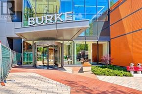 Toronto (North St. James Town) condo for rent - The Burke real estate office is located in a modern building.