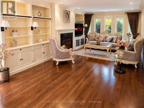 Markham (Thornhill) apartment for rent - A living room with a fireplace and a couch.