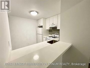 Toronto (Church-Yonge Corridor) condo for rent - A kitchen with white cabinets and a white countertop.