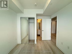 Toronto (Mount Pleasant West) condo for rent - A white interior with a doorway leading to another room.
