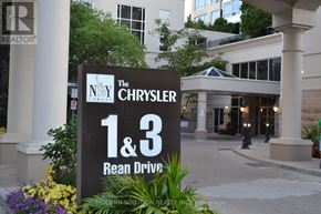 Toronto (Bayview Village) condo for rent - A sign for The Chrysler 1 & 3 Ream Drive is displayed in front of a building.