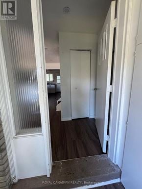 Oshawa (Vanier) apartment for rent - A hallway with a white door and a window with a white frame.