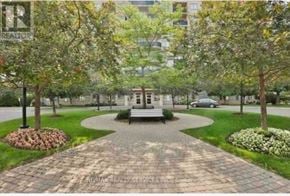 Brampton (Goreway Drive Corridor) condo for rent - A park with a brick pathway leading to a bench.