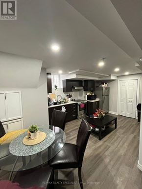 Mississauga (Lisgar) apartment for rent - A modern kitchen with a dining table set for two.