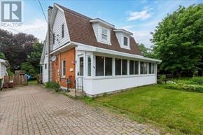 Grey Highlands apartment for rent - A house with a white and orange exterior is for sale.