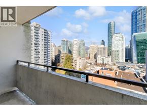 Vancouver apartment for rent - A balcony with a view of a city skyline.
