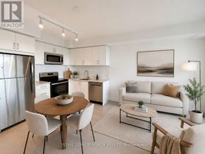 Toronto (Humber Heights) condo for rent - A modern kitchen with a dining table and chairs.