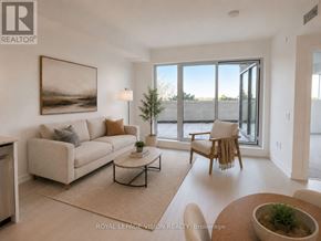 Toronto (Humber Heights) condo for rent - A living room with a couch, chair, and a painting on the wall.