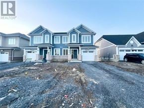 Loyalist (Bath) apartment for rent - A realtor photo of a house with a gravel driveway in front.
