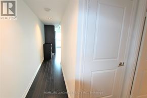 Toronto (Bay Street Corridor) condo for rent - A hallway with a white door and a black door on the other side.
