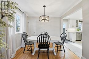 Brantford apartment for rent - A dining room with a white table and four chairs.