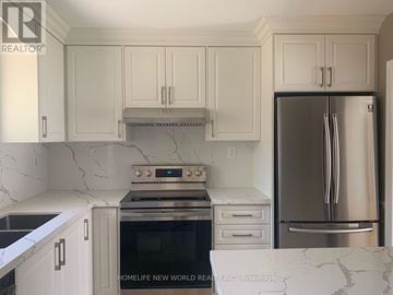 Toronto (Bayview Village) apartment for rent - A kitchen with white cabinets and a marble countertop.