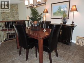 Burlington townhouse for rent - A dining room with a table set for two.