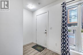 Brampton (Fletcher's Creek South) townhouse for rent - A room with a white door and a window with a curtain.
