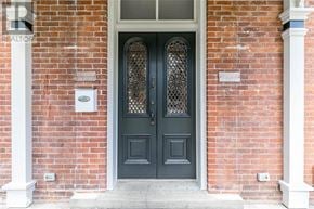 Collingwood apartment for rent - A black door with a glass window above it.