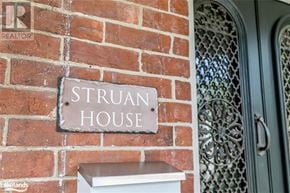Collingwood apartment for rent - A sign on a brick wall that says "Struan House".