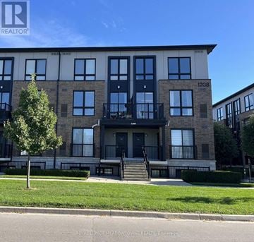 Milton (De Dempsey) townhouse for rent - A building with the number 1208 on it.