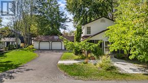 Fort Erie (Crystal Beach) apartment for rent - A white house with a driveway in front of it.