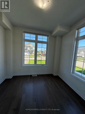 Loyalist (Bath) apartment for rent - A room with a large window and wooden flooring.