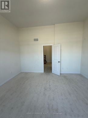 Loyalist (Bath) apartment for rent - A room with a doorway leading to another room.