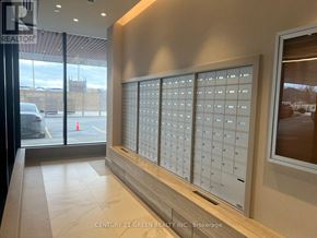 Oakville (Jm Joshua Meadows) condo for rent - A brokerage office with a large window covered in blinds.