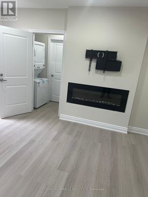 Brampton (Credit Valley) apartment for rent - A white door is open to a bathroom.
