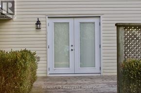 Woodstock (Woodstock - South) apartment for rent - A white double door with glass panels is the main focus of the image.