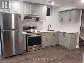 Mississauga (Churchill Meadows) apartment for rent - A kitchen with a stainless steel refrigerator and oven.