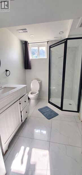 Brampton (Westgate) apartment for rent - A bathroom with a toilet, sink, and shower.