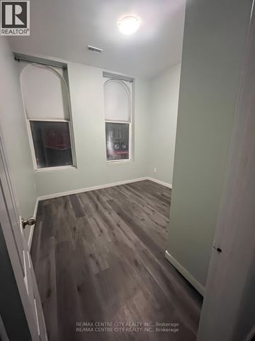 London East (East K) multi-family for rent - A kitchen with a sink and cabinets.