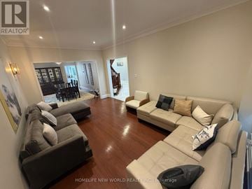 Richmond Hill (South Richvale) apartment for rent - A living room with a grey couch and a white couch.
