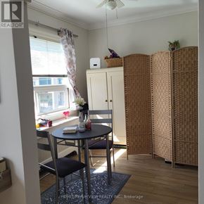 Toronto (Leaside) apartment for rent - A dining room with a table and chairs.