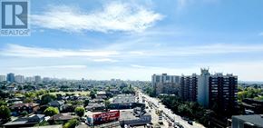 Toronto (Yorkdale-Glen Park) condo for rent - A cityscape with a clear sky and buildings of various heights.