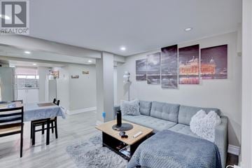 Hamilton (Stipley) apartment for rent - A living room with a grey couch and a coffee table.