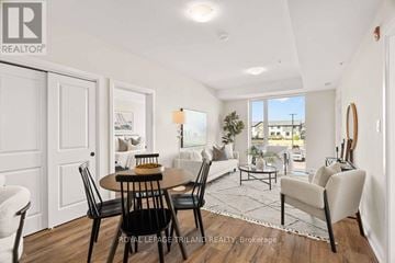 London North (North B) apartment for rent - A well-lit, spacious living room with a dining table and chairs.