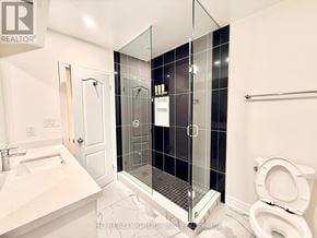 Toronto (Parkwoods-Donalda) apartment for rent - A bathroom with a walk in shower and a toilet.
