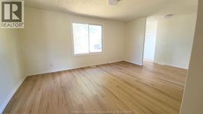 Windsor apartment for rent - A room with wooden flooring and a window.