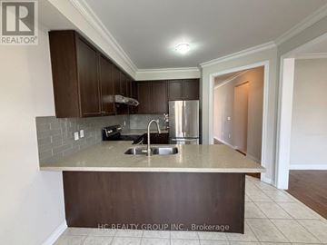 Markham (Wismer) apartment for rent - A kitchen with a sink and a counter.