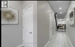 Brampton (Credit Valley) apartment for rent - A hallway with white walls and a white door.