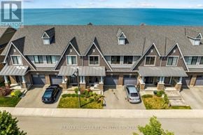Grimsby (Grimsby Beach) townhouse for rent - A bird's eye view of a row of houses with cars parked in front.