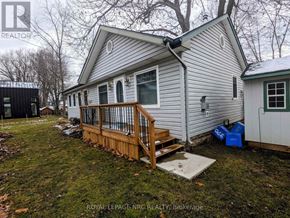 Fort Erie (Crystal Beach) apartment for rent - A house with a deck in front of it.
