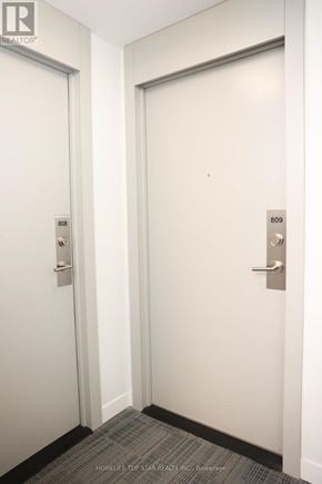 Toronto (Church-Yonge Corridor) condo for rent - Two doors with numbers 808 and 809 on them.