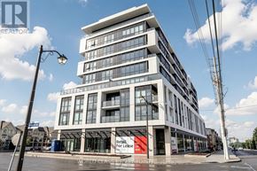Toronto (Clairlea-Birchmount) condo for rent - A modern multi-story building with a retail space for lease sign on the ground floor.