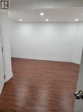 Ajax (Northwest Ajax) apartment for rent - A room with wooden flooring and white walls.