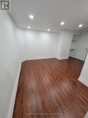 Ajax (Northwest Ajax) apartment for rent - A room with wooden flooring and white walls.