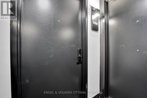Ottawa apartment for rent - A metal elevator door with a sign that says 800.