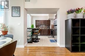 Mississauga (City Centre) condo for rent - A kitchen with a dining table and chairs.