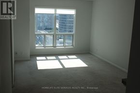 Toronto (Woburn) condo for rent - A room with a large window and a sign that says REALTOR.
